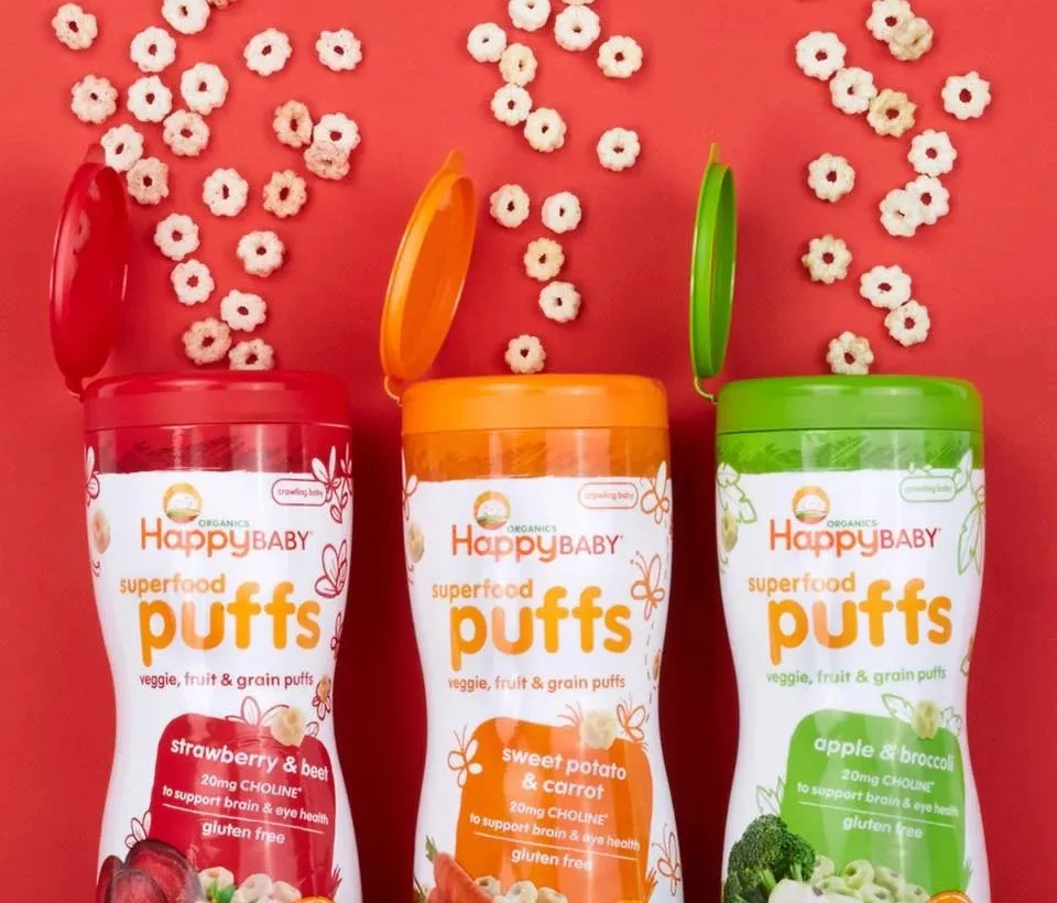 Hộp bánh ăn dặm Happy Baby Puffs vị chuối và bí ngô, được làm từ ngũ cốc hữu cơ