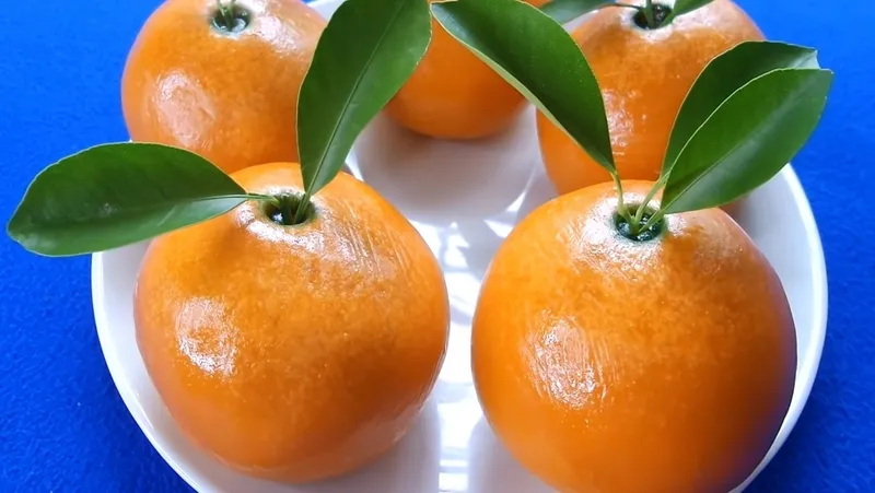 Một quả cam tươi mọng nước, biểu tượng của sự tươi mát và sức khỏe.