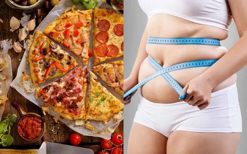 Một người phụ nữ trẻ đang băn khoăn về việc ăn pizza có bị béo không
