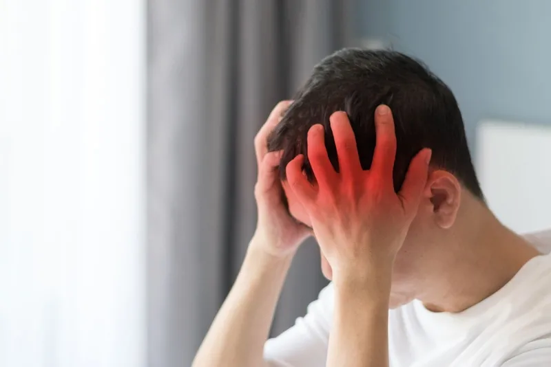 Biểu hiện ngộ độc xôi gấc như đau đầu, chóng mặt